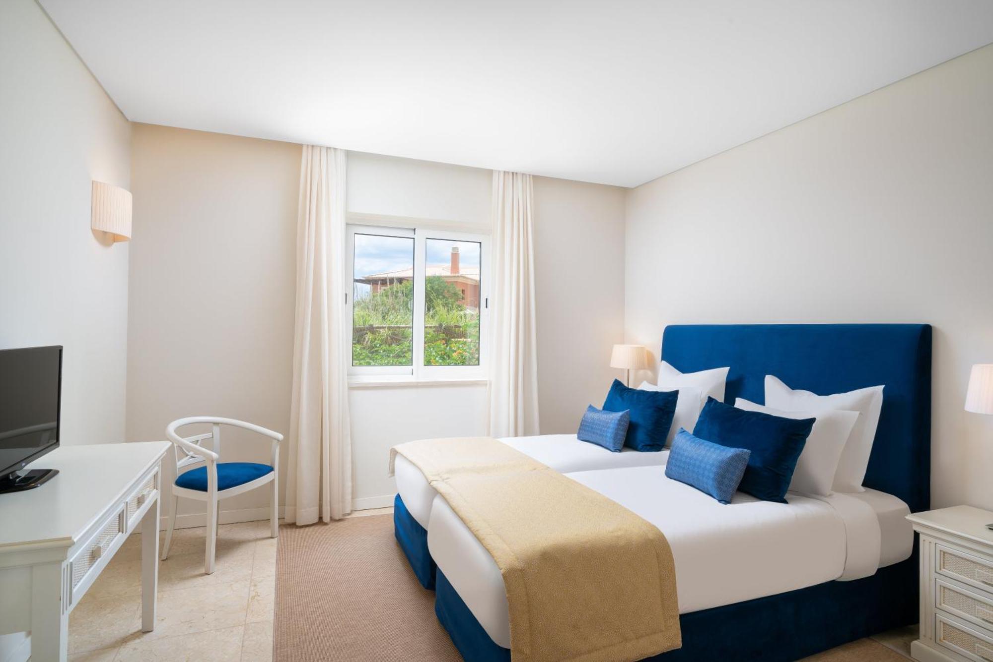 รีสอร์ทมองเต้ ซานโต้ การ์วอยโร ภายนอก รูปภาพ A bedroom at the hotel